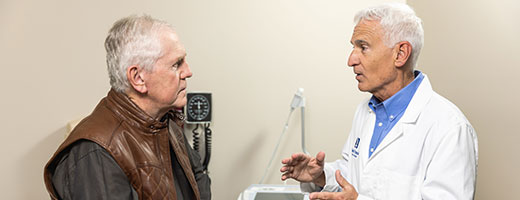 Dr. Stites meets with a patient