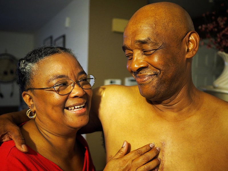 Calvin Box hugs his wife, Maria.
