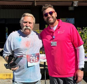 Runner and cancer survivor, Kent Edwards, is pictured with Nathan Gautier, Development Office – Special Events at Saint Francis Foundation