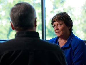 Robin Brugger meets with a patient