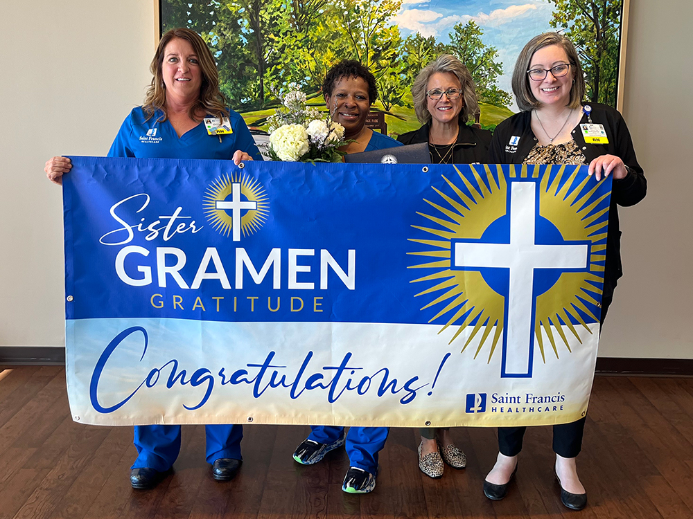 Lisa King, CNA accepts a Sister Gramen Gratitude Award