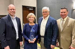 A photo of Justin Davison, Saint Francis Healthcare System President and Chief Executive Officer; Mary Trueblood; Dr. Michael Trueblood; Stacy Huff, Saint Francis Foundation Executive Director