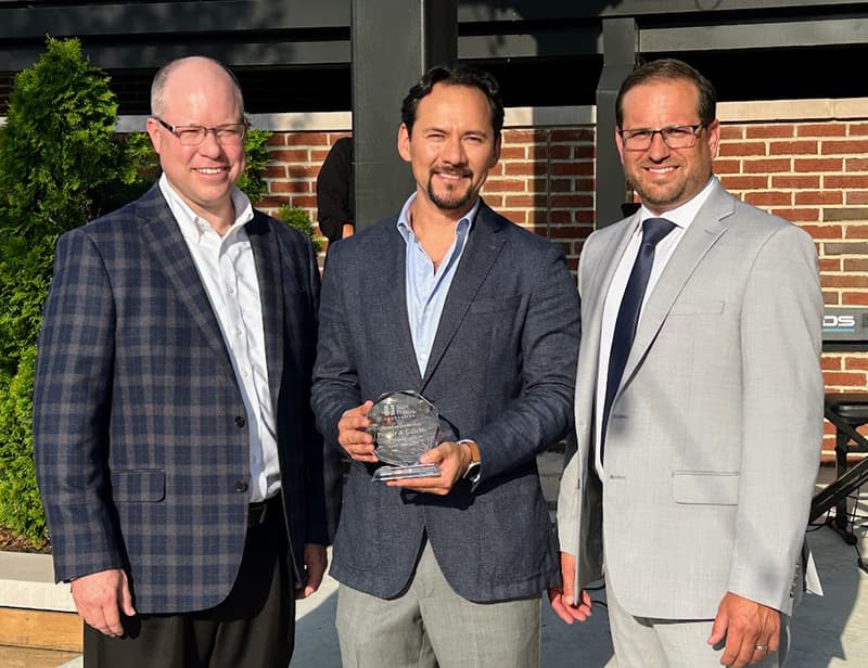 Justin Davison, Saint Francis President and CEO; Hector Guerrero, Procter & Gamble North America Senior Director; Todd Marchi, Saint Francis Foundation Board President