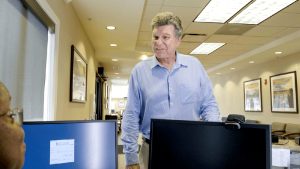 A patient checks in at registration